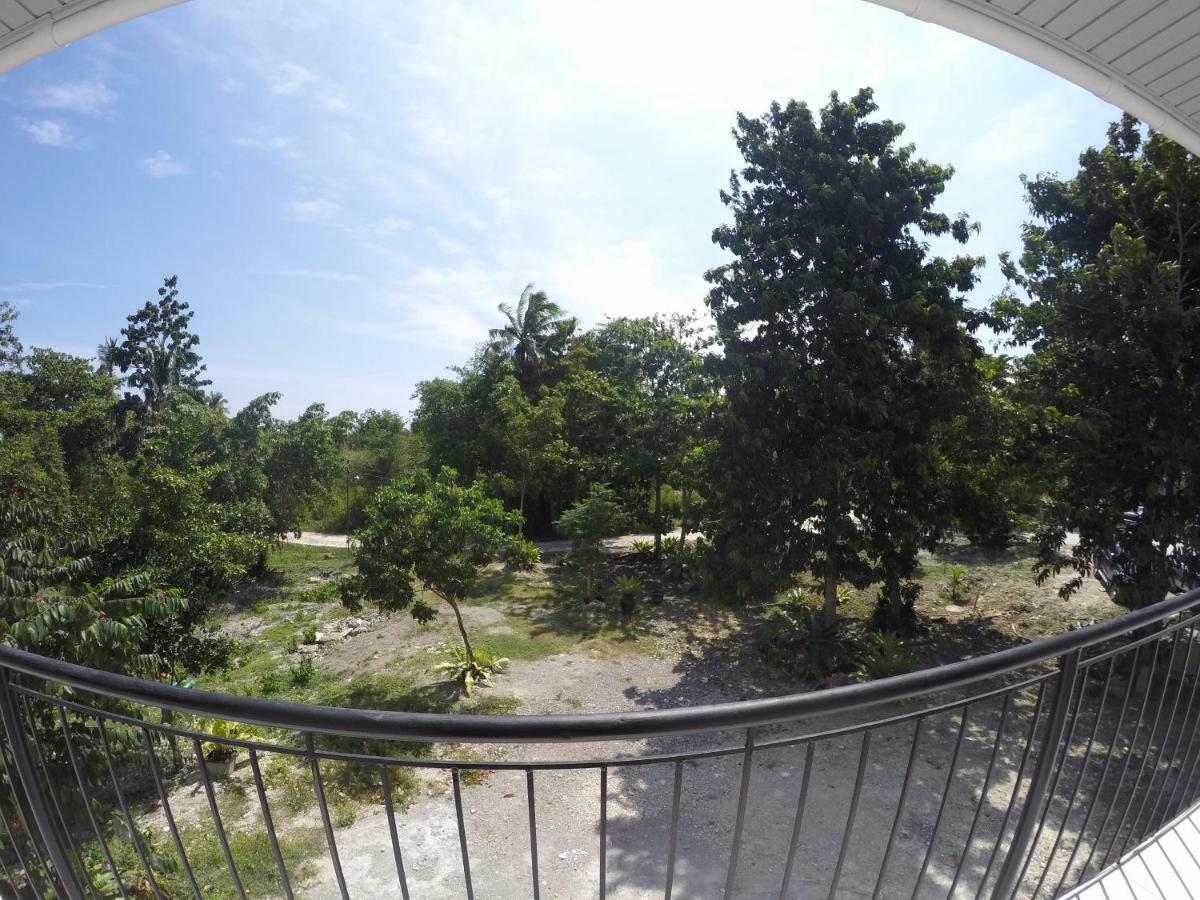 Отель Reddoorz Premium @ Napaling Point Tangnan Экстерьер фото